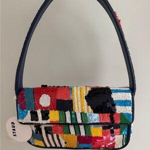 STAUD Red and Pink Shoulder Bag with Bold Stripes